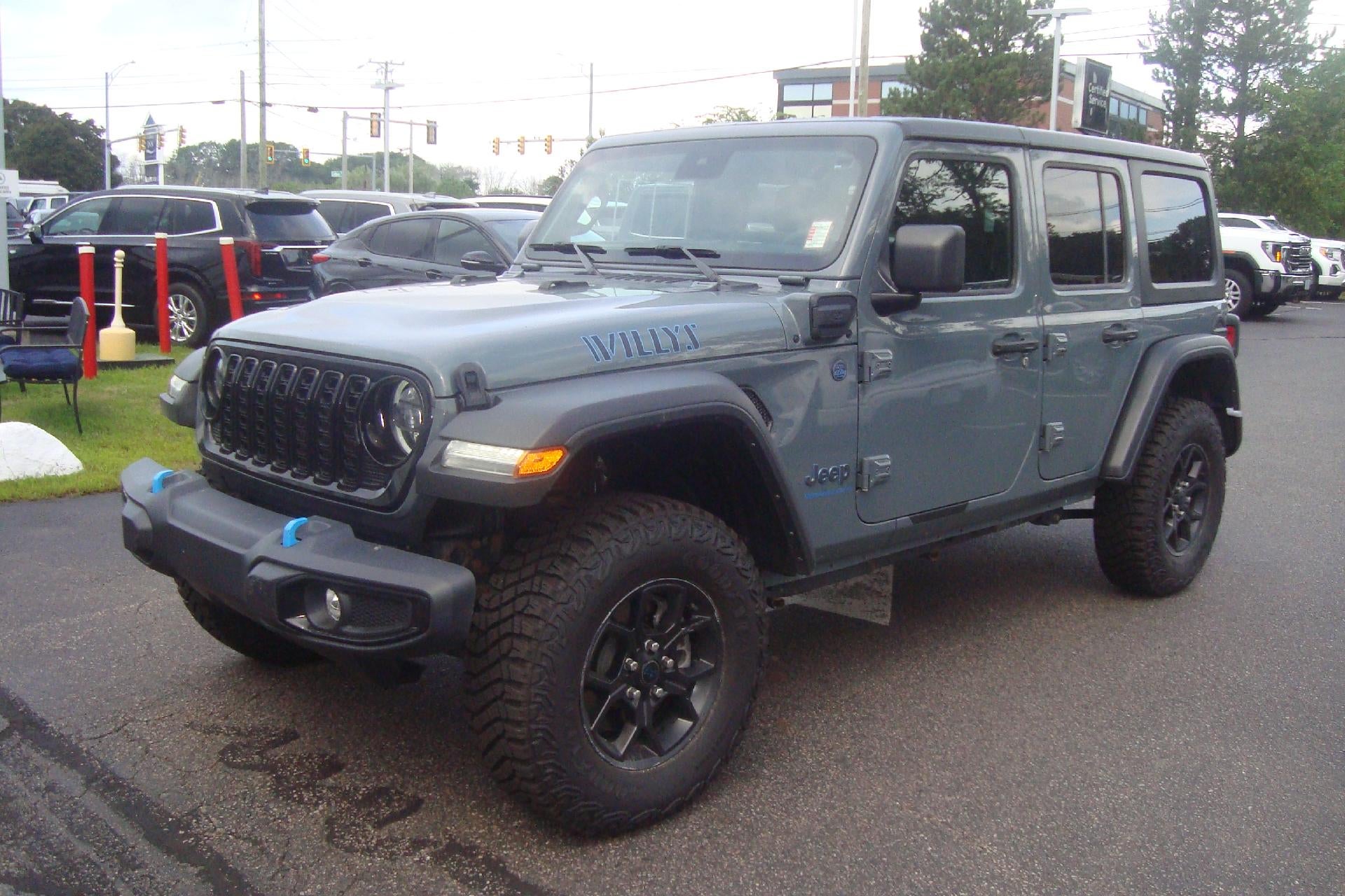 2024 Jeep Wrangler 4xe Base in Gray — front three-quarter view