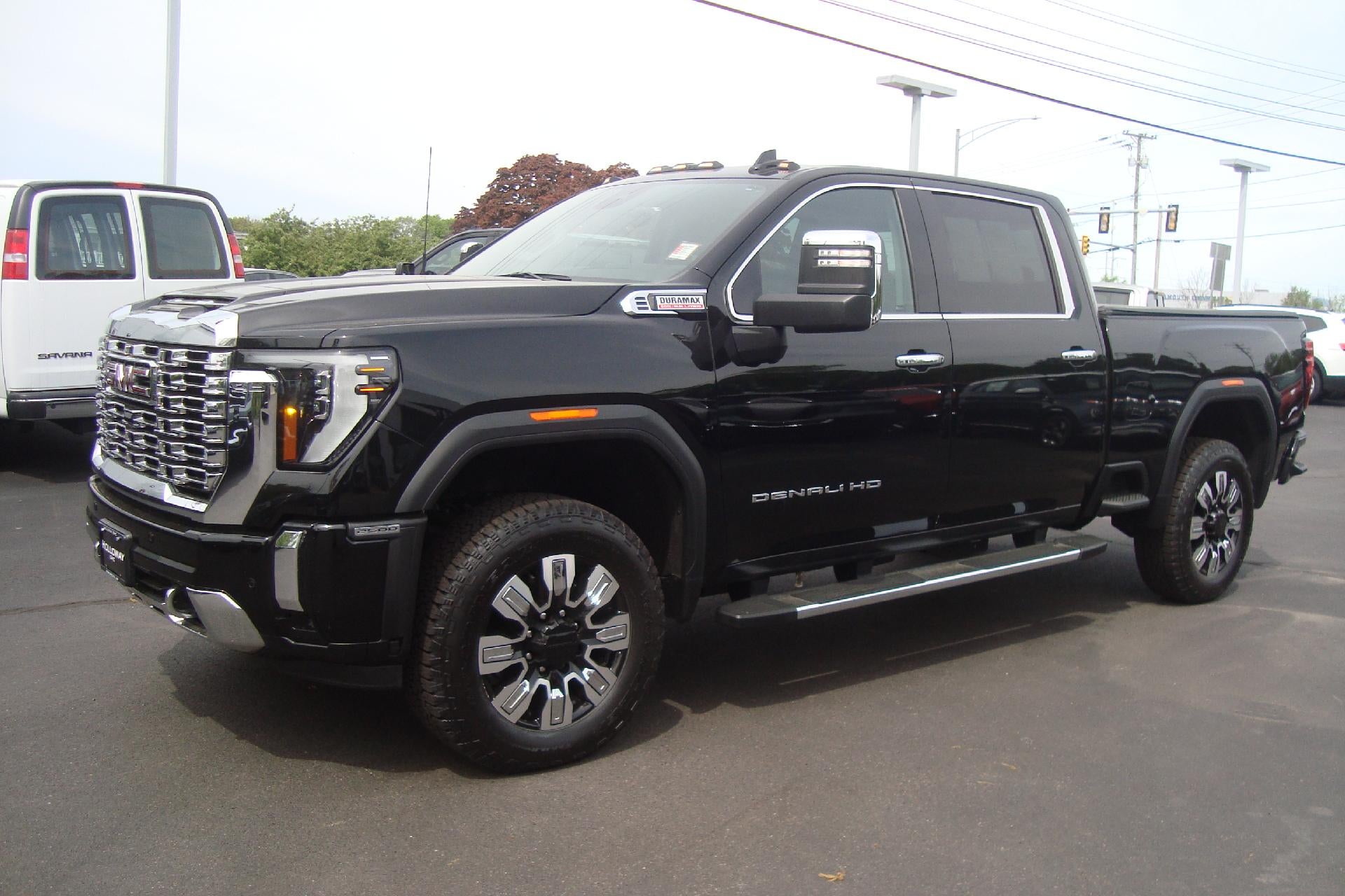 2025 GMC Sierra 2500 HD Denali in Onyx Black — front three-quarter view