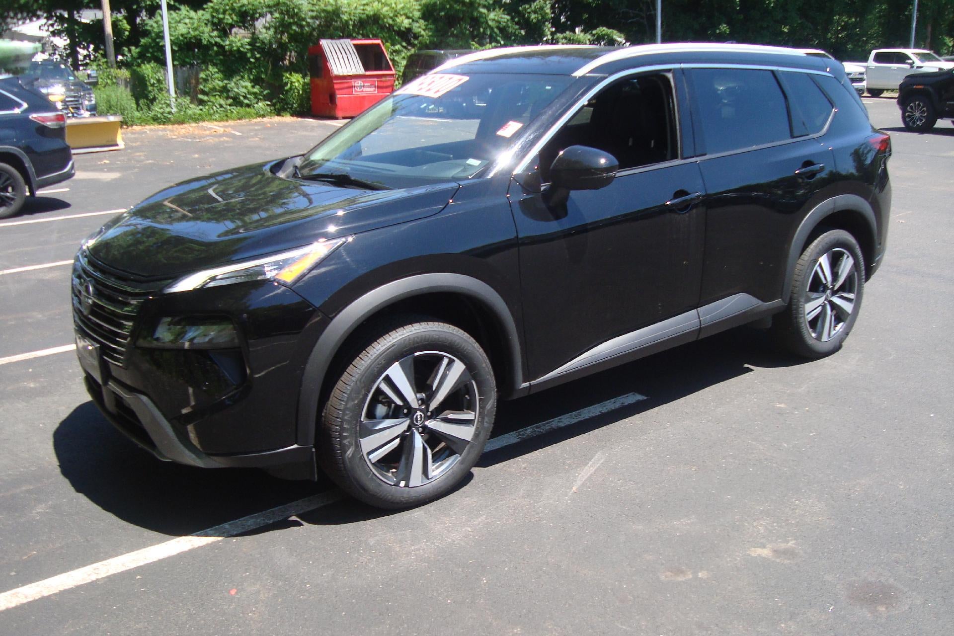 2026 Nissan Rogue SL in Blk — front three-quarter view