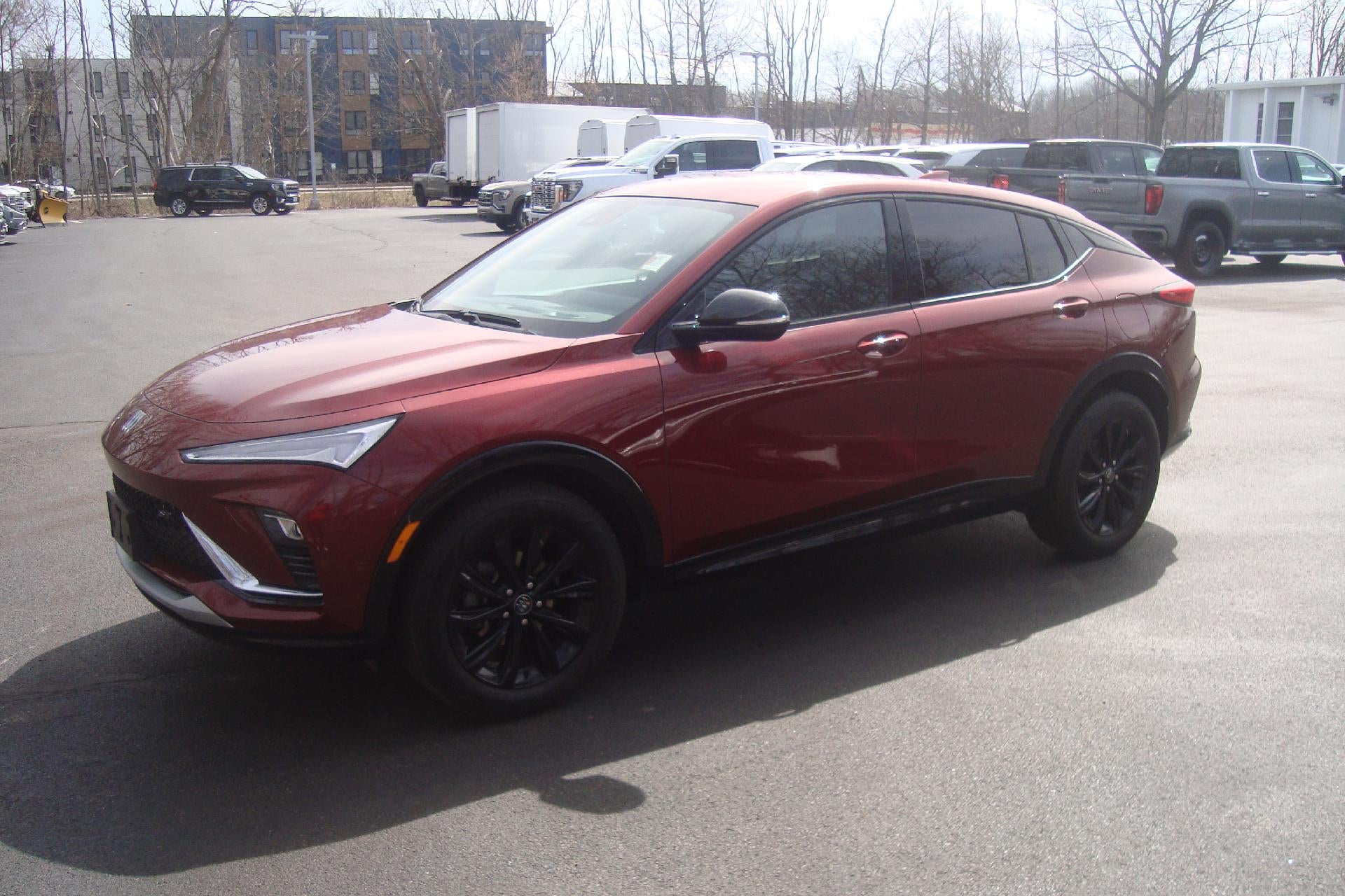 2024 Buick Envista Sport Touring in Cinnabar Metallic — front three-quarter view