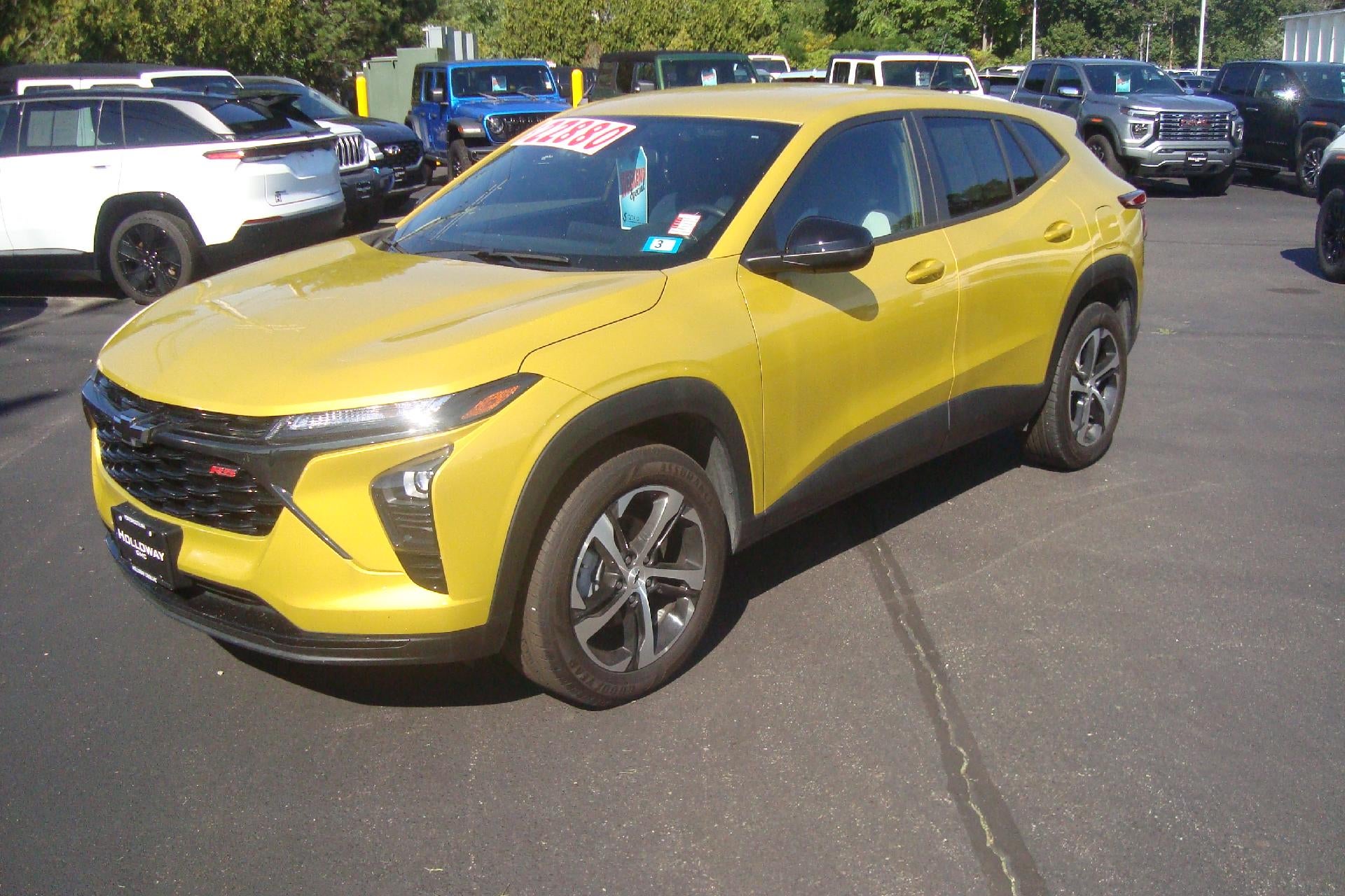 2024 Chevrolet Trax 1RS in Nitro Yellow Metallic — front three-quarter view