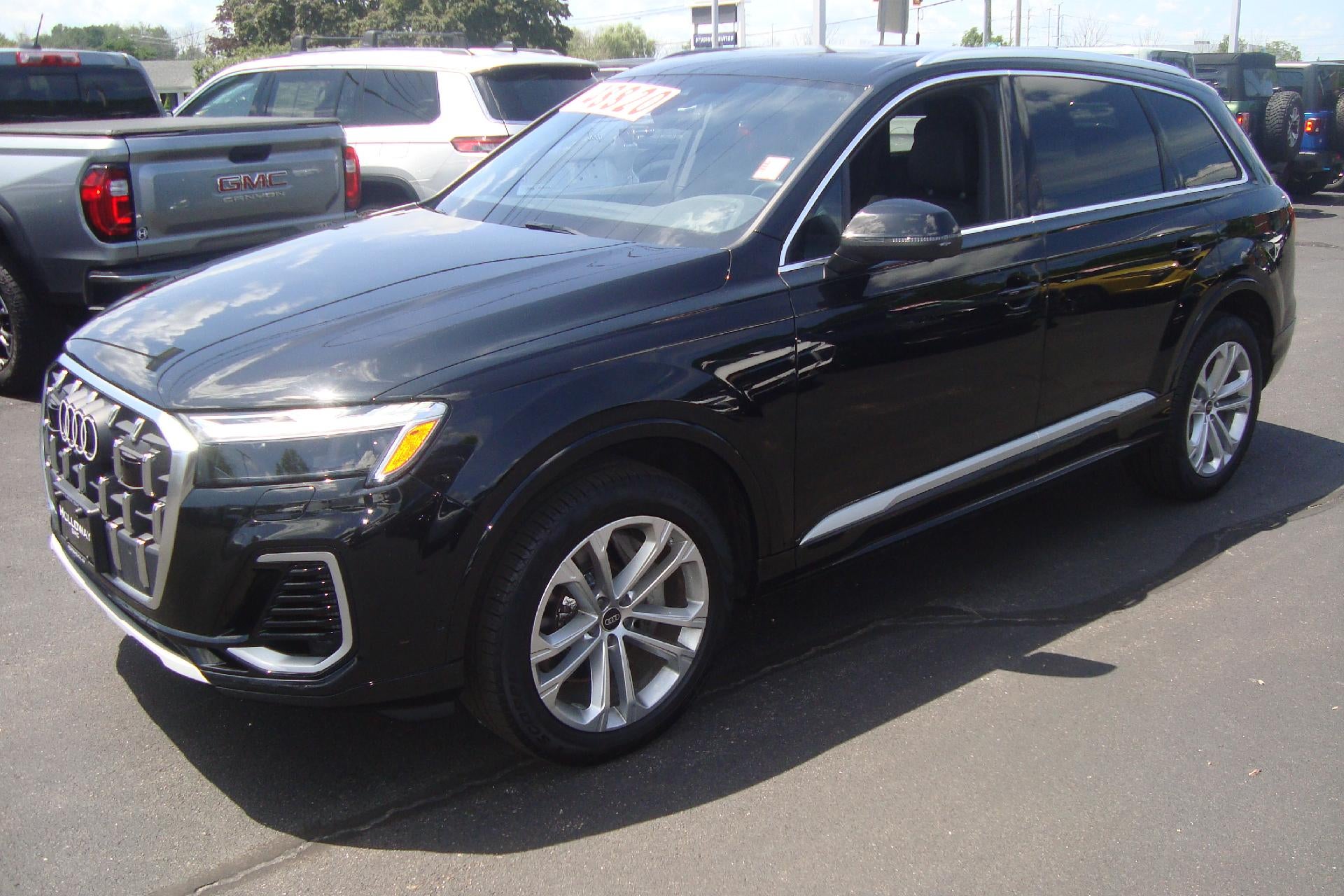 2025 Audi Q7 Premium Plus in Blk — front three-quarter view